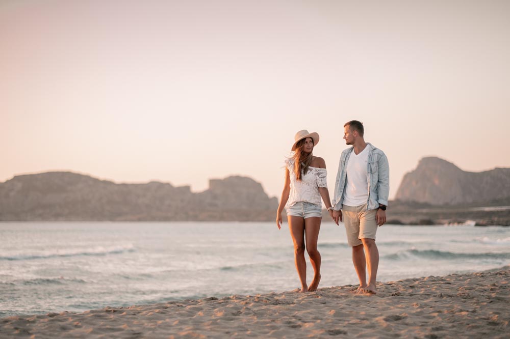 Nice couple during elopement photo shoot on the beach of Falsarana in Crete by professional wedding photographer